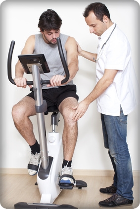 Patient at the physiotherapy doing exercises with his therapist