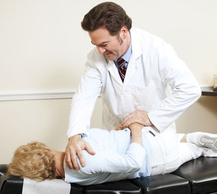 A physician making treatment of his patient