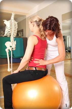 A woman receiving therapy for lower back pain at Horizon Physical Therapy