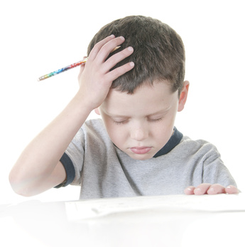 young boy stressed with work