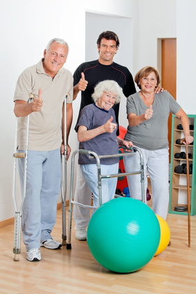 A group of seniors with a physical therapist, showing successful rehabilitation and positive outcomes at Horizon Physical Therapy in Flint, Michigan.