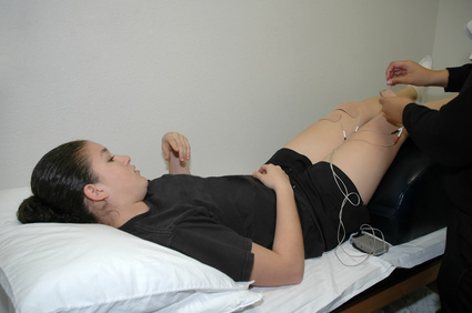 A teenage girl having physical therapy