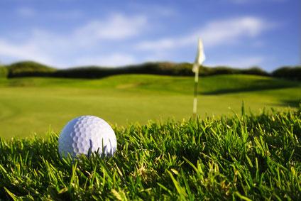 Golf ball in a gold ground